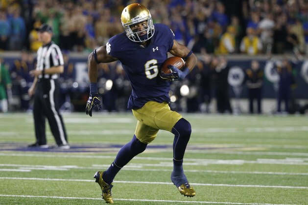 Notre Dame wide receiver Equanimeous St. Brown carries the ball during the second half of an NCAA college football game against Michigan State  Saturday, Sept. 17, 2016, in South Bend, Ind. (AP Photo/Charles Rex Arbogast)