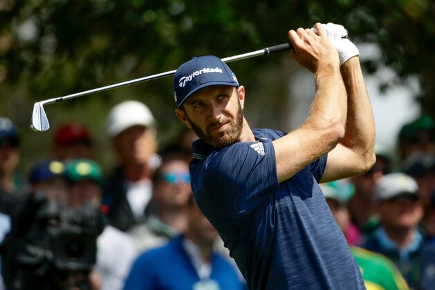 FILE - In this April 8, 2018, file photo, Dustin Johnson hits on the fourth hole during the fourth round at the Masters golf tournament, in Augusta, Ga. World No. 1 Dustin Johnson had another stellar Masters and hopes to keep his strong season going at the RBC Heritage. Johnson, born and raised in South Carolina, returns to the state's PGA Tour stop for the first time in nine years. (AP Photo/Chris Carlson, File)