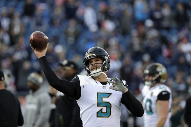 Jacksonville Jaguars quarterback Blake Bortles (5) warms up before the AFC championship NFL football game against the New England Patriots, Sunday, Jan. 21, 2018, in Foxborough, Mass. (AP Photo/David J. Phillip)