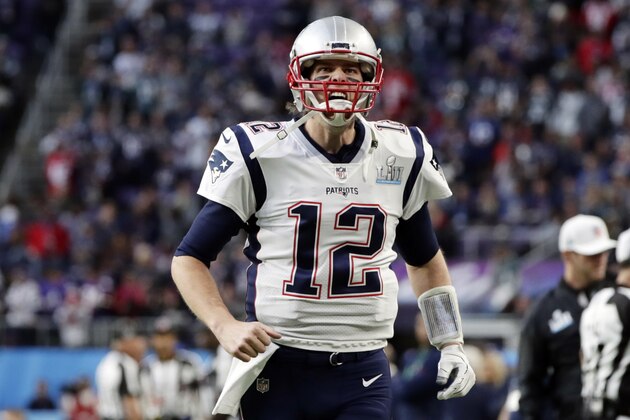 New England Patriots quarterback Tom Brady (12), runs to the field to warmup before the NFL Super Bowl 52 football game against the Philadelphia Eagles, Sunday, Feb. 4, 2018, in Minneapolis. (AP Photo/Frank Franklin II)