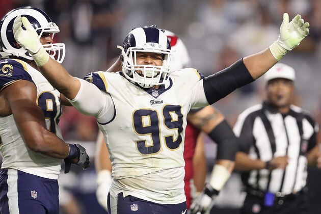 GLENDALE, AZ - DECEMBER 03:  Defensive end Aaron Donald #99 of the Los Angeles Rams reacts after a tackle against the Arizona Cardinals during the second half of the NFL game at the University of Phoenix Stadium on December 3, 2017 in Glendale, Arizona.  The Rams defeated the Cardinals 32-16.  (Photo by Christian Petersen/Getty Images)
