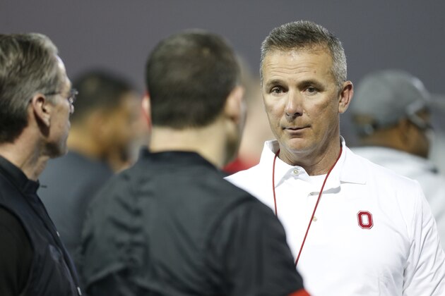 Ohio State head coach Urban Meyer watches players run drills during Ohio State's NFL Pro Day Thursday, March 22, 2018, in Columbus, Ohio. (AP Photo/Jay LaPrete)