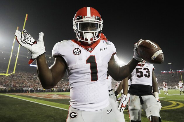 Georgia tailback Sony Michel (1) celebrates after scoring the game-winning touchdown in the second overtime period to give Georgia a 54-48 win over Oklahoma in the Rose Bowl NCAA college football game, Monday, Jan. 1, 2018, in Pasadena, Calif (AP Photo/Doug Benc) Georgia tailback Sony Michel (1) celebrates after scoring the game-winning touchdown in the second overtime period to give Georgia a 54-48 win over Oklahoma in the Rose Bowl NCAA college football game, Monday, Jan. 1, 2018, in Pasadena, Calif (AP Photo/Doug Benc)