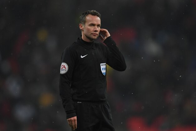 LONDON, ENGLAND - FEBRUARY 28:  Referee Paul Tierney consults VAR and dissalows a goal during the Emirates FA Cup Fifth Round Replay match between Tottenham Hotspur and Rochdale on February 28, 2018 in London, United Kingdom.  (Photo by Shaun Botterill/Getty Images)