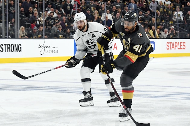 LAS VEGAS, NV - APRIL 11:  Pierre-Edouard Bellemare #41 of the Vegas Golden Knights shoots against Drew Doughty #8 of the Los Angeles Kings in the second period of Game One of the Western Conference First Round at T-Mobile Arena on April 11, 2018 in Las Vegas, Nevada. The Golden Knights won 1-0.  (Photo by Ethan Miller/Getty Images)
