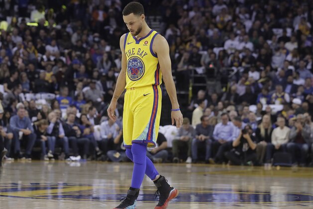 Golden State Warriors guard Stephen Curry (30) walks on the court to shoot free throws during the first half of an NBA basketball game against the San Antonio Spurs in Oakland, Calif., Thursday, March 8, 2018. (AP Photo/Jeff Chiu)