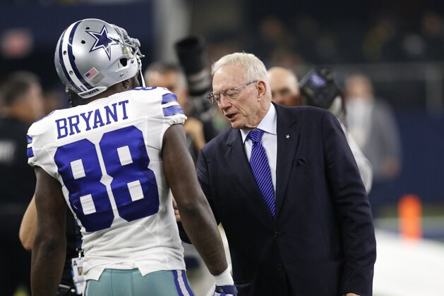 Dallas Cowboys' Dez Bryant talks with team owner Jerry Jones on the field before a half time Ring Of Honor presentation during an NFL football game against the Seattle Seahawks on  Sunday, Nov. 1, 2015, in Arlington, Texas. (AP Photo/Roger Steinman)
