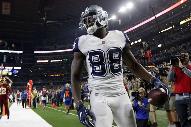 Dallas Cowboys wide receiver Dez Bryant (88) smiles after catching a touchdown pass in the second half of an NFL football game against the Washington Redskins on Thursday, Nov. 30, 2017, in Arlington, Texas. (AP Photo/Ron Jenkins)