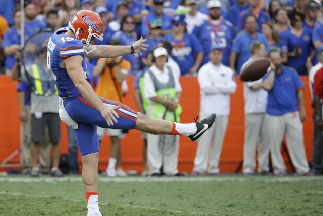 Florida punter Johnny Townsend kicks against Tennessee during the second half of an NCAA college football game, Saturday, Sept. 26, 2015, in Gainesville, Fla. (AP Photo/John Raoux)