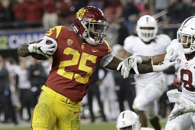 Southern California running back Ronald Jones II (25) scores a touchdown against Stanford safety Justin Reid during the second half of the Pac-12 Conference championship NCAA college football game in Santa Clara, Calif., Friday, Dec. 1, 2017. (AP Photo/Marcio Jose Sanchez)