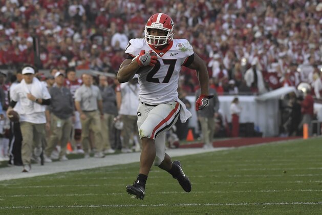 Georgia running back Nick Chubb (27) runs for a touchdown against Oklahoma during the second half of the Rose Bowl NCAA college football game Monday, Jan. 1, 2018, in Pasadena, Calif. (AP Photo/Mark J. Terrill)