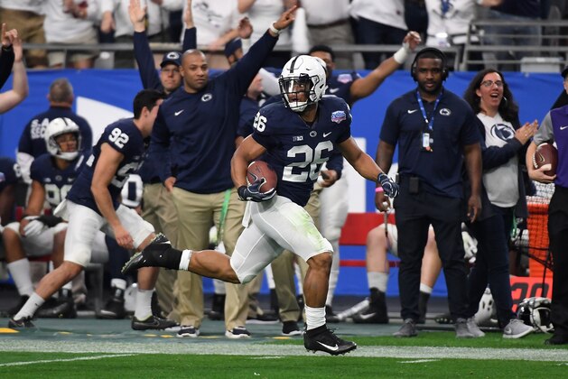 GLENDALE, AZ - DECEMBER 30:  Saquon Barkley #26 of Penn State Nittany Lions rushes for a touchdown against the Washington Huskies during the Playstation Fiesta Bowl at University of Phoenix Stadium on December 30, 2017 in Glendale, Arizona.  (Photo by Norm Hall/Getty Images)