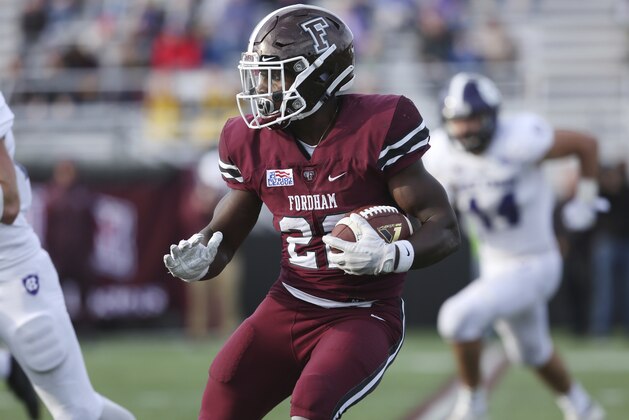 Fordham's Chase Edmonds #22 in action against Holy Cross during an NCAA college football game, Saturday, Nov. 4, 2017, in Bronx, N.Y. Holy Cross won 42-20. (AP Photo/Steve Luciano)