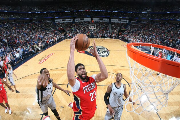 NEW ORLEANS, LA - APRIL 11:  Anthony Davis #23 of the New Orleans Pelicans goes to the basket against the San Antonio Spurs on April 11, 2018 at Smoothie King Center in New Orleans, Louisiana. NOTE TO USER: User expressly acknowledges and agrees that, by downloading and or using this Photograph, user is consenting to the terms and conditions of the Getty Images License Agreement. Mandatory Copyright Notice: Copyright 2018 NBAE (Photo by Layne Murdoch Jr./NBAE via Getty Images)