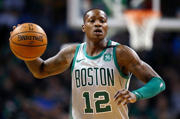 Boston Celtics' Terry Rozier plays against the Atlanta Hawks during the third quarter of an NBA basketball game in Boston, Sunday, April 8, 2018. The Hawks won 112-106. (AP Photo/Michael Dwyer)