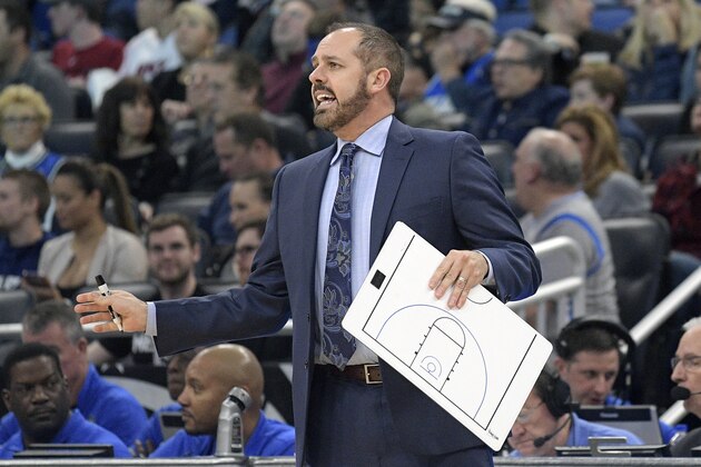 Orlando Magic head coach Frank Vogel calls out instructions from the sideline during the first half of an NBA basketball game against the Miami Heat Saturday, Dec. 30, 2017, in Orlando, Fla. (AP Photo/Phelan M. Ebenhack)
