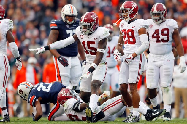 AUBURN, AL - NOVEMBER 25:  Ronnie Harrison #15 of the Alabama Crimson Tide celebrates after a tackle during the second quarter against the Auburn Tigers at Jordan Hare Stadium on November 25, 2017 in Auburn, Alabama.  (Photo by Kevin C. Cox/Getty Images)