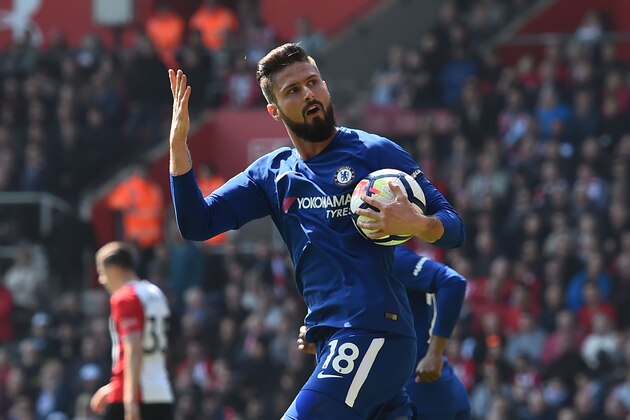 Chelsea's French attacker Olivier Giroud celebrates scoring their first goal during the English Premier League football match between Southampton and Chelsea at St Mary's Stadium in Southampton, southern England on April 14, 2018. / AFP PHOTO / Glyn KIRK / RESTRICTED TO EDITORIAL USE. No use with unauthorized audio, video, data, fixture lists, club/league logos or 'live' services. Online in-match use limited to 75 images, no video emulation. No use in betting, games or single club/league/player publications. / (Photo credit should read GLYN KIRK/AFP/Getty Images) Chelsea's French attacker Olivier Giroud celebrates scoring their first goal during the English Premier League football match between Southampton and Chelsea at St Mary's Stadium in Southampton, southern England on April 14, 2018. / AFP PHOTO / Glyn KIRK / RESTRICTED TO EDITORIAL USE. No use with unauthorized audio, video, data, fixture lists, club/league logos or 'live' services. Online in-match use limited to 75 images, no video emulation. No use in betting, games or single club/league/player publications. / (Photo credit should read GLYN KIRK/AFP/Getty Images)