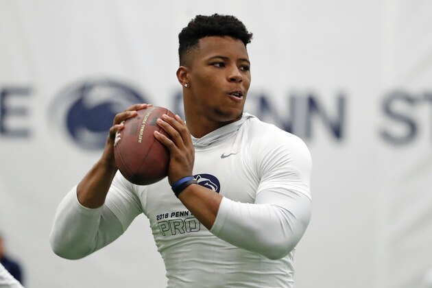 Penn State running back Saquon Barkley, tosses a football during Penn State Pro Day in State College, Pa., Tuesday, March 20, 2018. Barkley did not participate in the drills. (AP Photo/Gene J. Puskar)