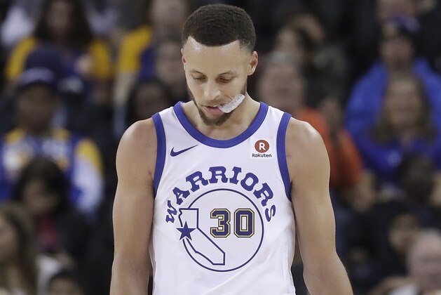 Golden State Warriors guard Stephen Curry (30) walks on the floor during the second half of the team's NBA basketball game against the Atlanta Hawks in Oakland, Calif., Friday, March 23, 2018. (AP Photo/Jeff Chiu) Golden State Warriors guard Stephen Curry (30) walks on the floor during the second half of the team's NBA basketball game against the Atlanta Hawks in Oakland, Calif., Friday, March 23, 2018. (AP Photo/Jeff Chiu)