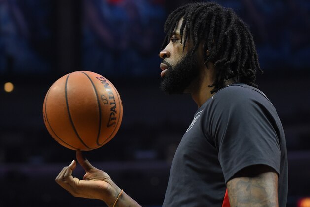 LOS ANGELES, CA - APRIL 09:  DeAndre Jordan #6 of the Los Angeles Clippers spins the ball while on the bench in the second half of the game against the New Orleans Pelicans at Staples Center on April 9, 2018 in Los Angeles, California.  NOTE TO USER: User expressly acknowledges and agrees that, by downloading and or using this photograph, User is consenting to the terms and conditions of the Getty Images License Agreement.  (Photo by Jayne Kamin-Oncea/Getty Images)