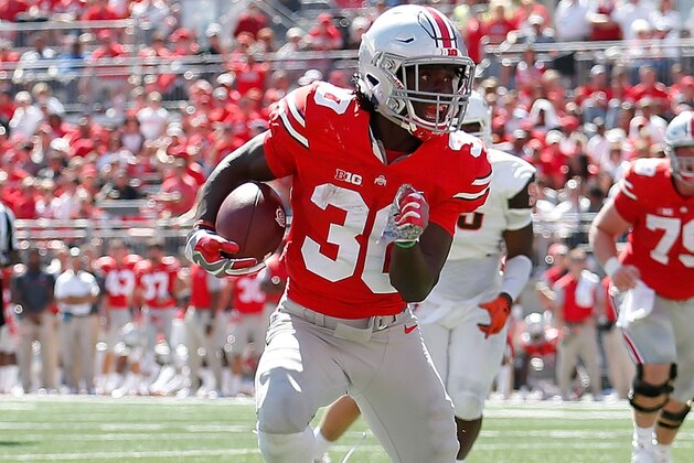 COLUMBUS, OH - SEPTEMBER 3:  Demario McCall #30 of the Ohio State Buckeyes carries the ball during the game against the Bowling Green Falcons on September 3, 2016 at Ohio Stadium in Columbus, Ohio. Ohio State defeated Bowling Green 77-10. (Photo by Kirk Irwin/Getty Images)