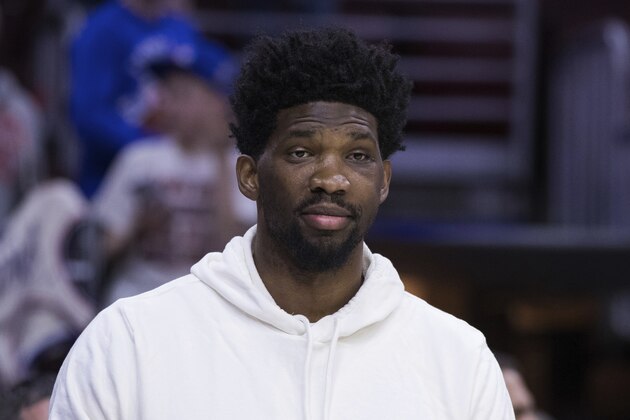 Philadelphia 76ers' Joel Embiid, of Cameroon, looks on prior to the first half of an NBA basketball game against the Cleveland Cavaliers, Friday, April 6, 2018, in Philadelphia. The 76ers won 132-130. (AP Photo/Chris Szagola) Philadelphia 76ers' Joel Embiid, of Cameroon, looks on prior to the first half of an NBA basketball game against the Cleveland Cavaliers, Friday, April 6, 2018, in Philadelphia. The 76ers won 132-130. (AP Photo/Chris Szagola)