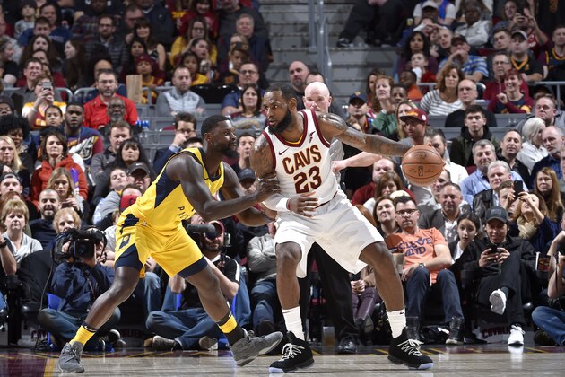 CLEVELAND, OH - JANUARY 26:  LeBron James #23 of the Cleveland Cavaliers handles the ball against the Indiana Pacers on January 26, 2018 at Quicken Loans Arena in Cleveland, Ohio. NOTE TO USER: User expressly acknowledges and agrees that, by downloading and/or using this Photograph, user is consenting to the terms and conditions of the Getty Images License Agreement. Mandatory Copyright Notice: Copyright 2018 NBAE  (Photo by David Liam Kyle/NBAE via Getty Images)