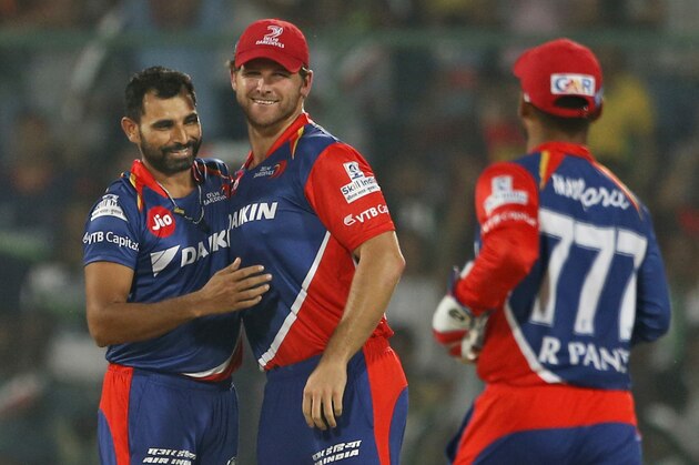 Delhi Daredevils' bowler Mohammed Shami, left, and teammate Corey Anderson celebrate the dismissal of Sunrisers Hyderabad's Kane batsman Williamson during their Indian Premier League (IPL) cricket match in New Delhi, India, Tuesday, May 2, 2017. (AP Photo/Altaf Qadri)