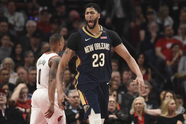 PORTLAND, OR - APRIL 14: Anthony Davis #23 of the New Orleans Pelicans reacts after making a shot during the second half of game one of the the first round of the 2018 NBA Playoffs against the Portland Trail Blazers at the Moda Center on April 14, 2018 in Portland, Oregon. The Pelicans won 97-95. (Photo by Steve Dykes/Getty Images)  NOTE TO USER: User expressly acknowledges and agrees that, by downloading and or using this photograph, User is consenting to the terms and conditions of the Getty Images License Agreement.