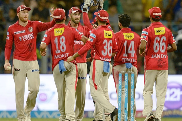 Kings XI Punjab captain Glenn Maxwell (3rd L) celebrates with teammates after the wicket of Mumbai Indians captain Rohit Sharma during the 2017 Indian Premier League (IPL) Twenty20 cricket match between Mumbai Indians and King's XI Punjab at The Wankhede Stadium Cricket Stadium in Mumbai on May 11, 2017. ----IMAGE RESTRICTED TO EDITORIAL USE - STRICTLY NO COMMERCIAL USE----- GETTYOUT  / AFP PHOTO / PUNIT PARANJPE / ----IMAGE RESTRICTED TO EDITORIAL USE - STRICTLY NO COMMERCIAL USE----- GETTYOUT         (Photo credit should read PUNIT PARANJPE/AFP/Getty Images)