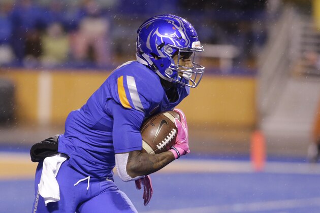 Boise State wide receiver Cedrick Wilson (1) returns a kickoff during the first half of an NCAA college football game against Wyoming in Boise, Idaho, on Saturday, Oct. 21, 2017. Boise State won 24-14. (AP Photo/Otto Kitsinger)