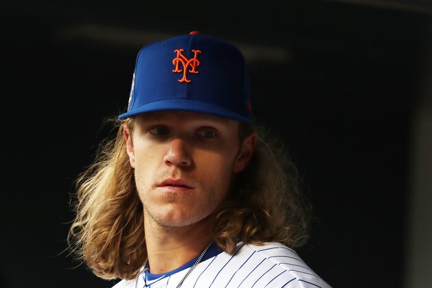 NEW YORK, NY - APRIL 15:  Noah Syndergaard #34 of the New York Mets lloks on against the Milwaukee Brewers during their game at Citi Field on April 15, 2018 in New York City. All players are wearing #42 in honor of Jackie Robinson Day.  (Photo by Al Bello/Getty Images)