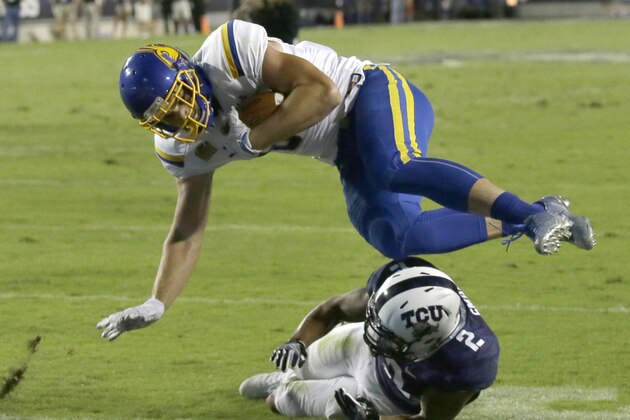 South Dakota State tight end Dallas Goedert (86) scores a touchdown against TCU safety Niko Small (2) during the second half of an NCAA college football game Saturday, Sept. 3, 2016, in Fort Worth, Texas. TCU won 59-41. (AP Photo/LM Otero)