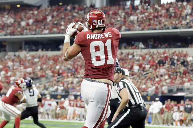 Oklahoma tight end Mark Andrews (81) catches a pass in the end zone for a touchdown in the first half of the Big 12 Conference championship NCAA college football game against TCU on Saturday, Dec. 2, 2017, in Arlington, Texas. (AP Photo/Tony Gutierrez)