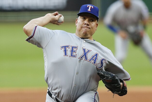 HOUSTON, TX - APRIL 15:  Bartolo Colon #40 of the Texas Rangers pitches in the first inning against the Houston Astros at Minute Maid Park on April 15, 2018 in Houston, Texas. All players are wearing #42 in honor of Jackie Robinson Day.  (Photo by Bob Levey/Getty Images)