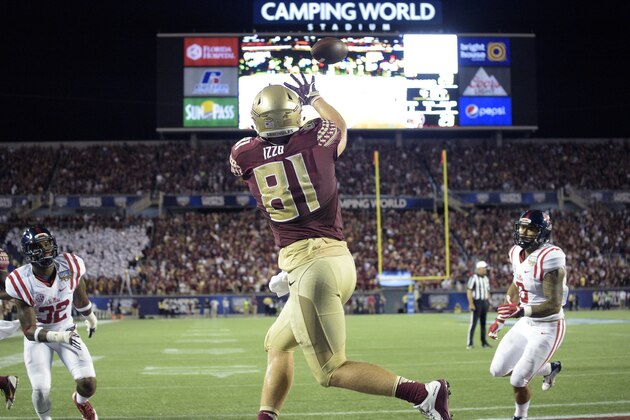 Florida State tight end Ryan Izzo (81) catches a pass for a touchdown between Mississippi linebacker Temario Strong (32) and linebacker Rommel Mageo, right, during the second half of an NCAA college football game in Orlando, Fla., Monday, Sept. 5, 2016. Florida State won 45-34. (AP Photo/Phelan M. Ebenhack)