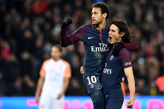 Paris Saint-Germain's Brazilian forward Neymar and Paris Saint-Germain's Uruguayan forward Edinson Cavani celebrate a goal  during the French L1 football match between Paris Saint-Germain (PSG) and Montpellier (MHSC) at the Parc des Princes stadium in Paris on January 27, 2018. / AFP PHOTO / FRANCK FIFE        (Photo credit should read FRANCK FIFE/AFP/Getty Images)