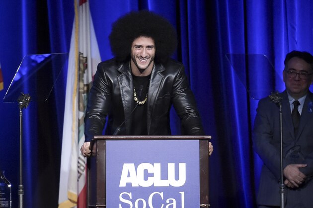 FILE - In this Dec. 3, 2017, file photo, Colin Kaepernick attends the 2017 ACLU SoCal's Bill of Rights Dinner at the Beverly Wilshire Hotel in Beverly Hills, Calif. Despite their vastly divergent methods, Colin Kaepernick and LeBron James helped set a stake in the ground, declaring to athletes across all sports that their platforms could be used for more than fun and games in the 21st century. (Photo by Richard Shotwell/Invision/AP, File)