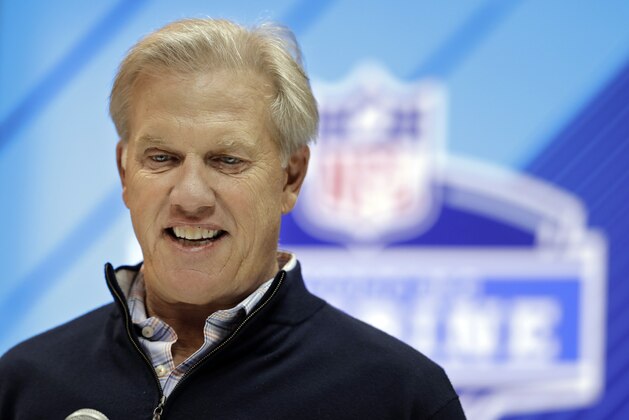 FILE - In this Wednesday, Feb. 28, 2018, file photo, Denver Broncos general manager John Elway speaks during a press conference at the NFL football scouting combine, in Indianapolis. Elway has found it difficult to land a franchise quarterback from the college ranks like he did in free agency with Peyton Manning six years ago. Last year, the Broncos cycled through his draft picks Brock Osweiler, Trevor Siemian and Paxton Lynch during the team's worst season in decades. (AP Photo/Darron Cummings, File)
