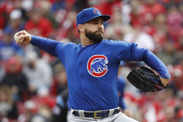 Chicago Cubs starting pitcher Tyler Chatwood throws in the second inning of a baseball game against the Cincinnati Reds, Monday, April 2, 2018, in Cincinnati. (AP Photo/John Minchillo)