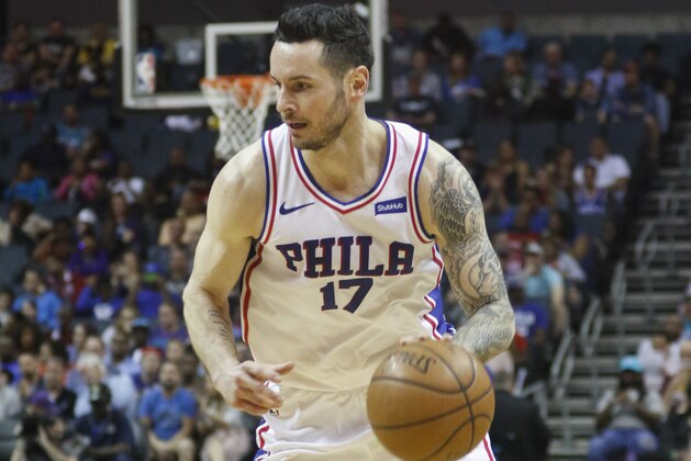 Philadelphia 76ers guard JJ Redick drives against the Charlotte Hornets in the second half of an NBA basketball game in Charlotte, N.C., on Sunday, April 1, 2018. Philadelphia won 119-102. (AP Photo/Nell Redmond)