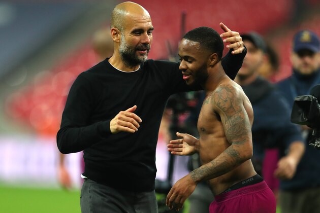 LONDON, ENGLAND - APRIL 14:  Josep Guardiola, Manager of Manchester City celebrates victory with Raheem Sterling of Manchester City after the Premier League match between Tottenham Hotspur and Manchester City at Wembley Stadium on April 14, 2018 in London, England.  (Photo by Catherine Ivill/Getty Images)