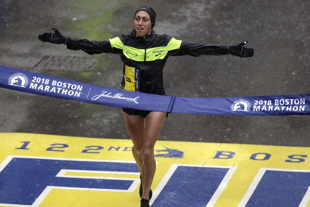 Desiree Linden, of Washington, Mich., wins the women's division of the 122nd Boston Marathon on Monday, April 16, 2018, in Boston. She is the first American woman to win the race since 1985. (AP Photo/Charles Krupa)