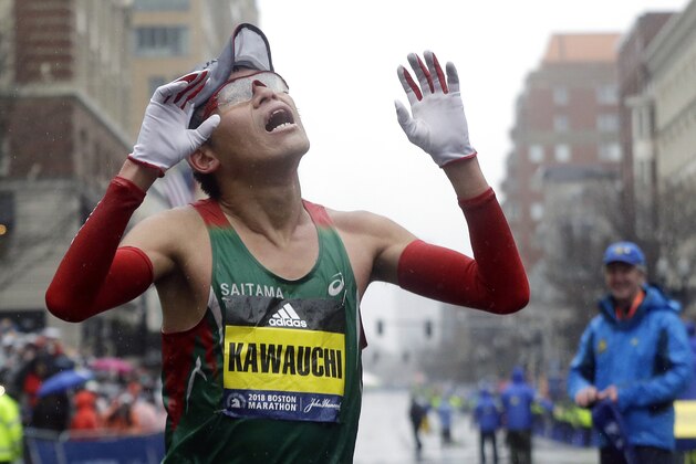 Yuki Kawauchi, of Japan, celebrates after winning the 122nd Boston Marathon on Monday, April 16, 2018, in Boston. He is the first Japanese man to win the race since 1987. (AP Photo/Elise Amendola)