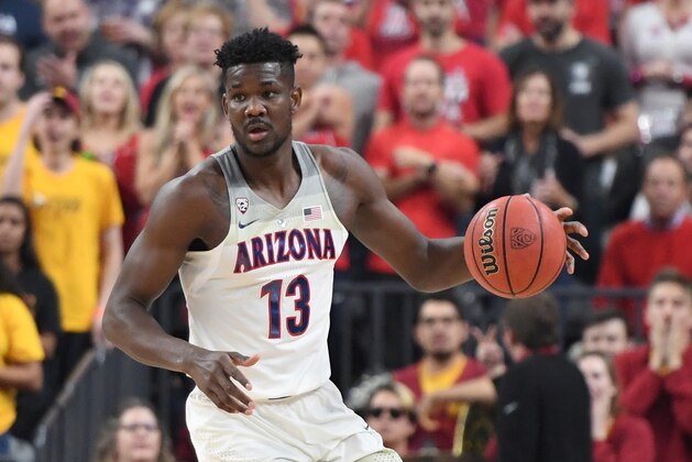 LAS VEGAS, NV - MARCH 10:  Deandre Ayton #13 of the Arizona Wildcats looks to pass against the USC Trojans during the championship game of the Pac-12 basketball tournament at T-Mobile Arena on March 10, 2018 in Las Vegas, Nevada. The Wildcats won 75-61.  (Photo by Ethan Miller/Getty Images)