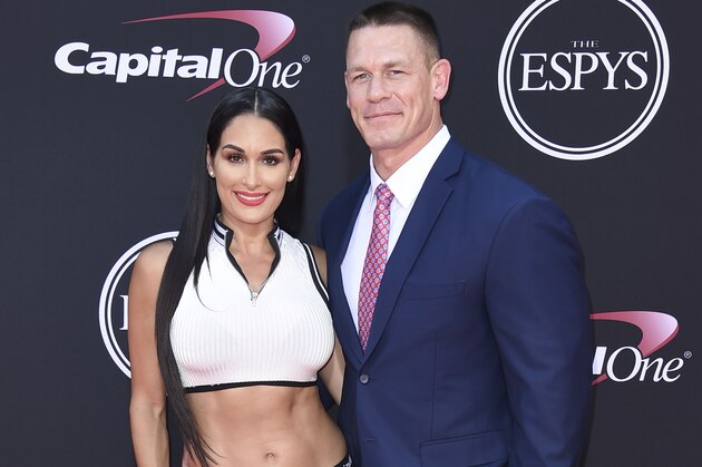 John Cena, right, and Nikki Bella arrive at the ESPYS at the Microsoft Theater on Wednesday, July 12, 2017, in Los Angeles. (Photo by Jordan Strauss/Invision/AP)