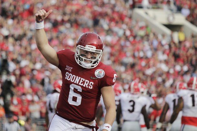 Oklahoma quarterback Baker Mayfield celebrates after running back Rodney Anderson scored a touchdown against Georgia during the first half of the Rose Bowl NCAA college football game Monday, Jan. 1, 2018, in Pasadena, Calif. (AP Photo/Jae C. Hong)