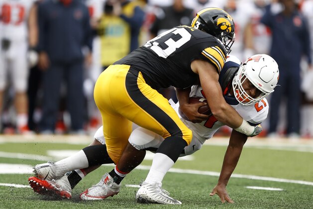 Iowa linebacker Josey Jewell, left, tackles Illinois running back Ra'Von Bonner (21) during the first half of an NCAA college football game, Saturday, Oct. 7, 2017, in Iowa City, Iowa. (AP Photo/Charlie Neibergall)