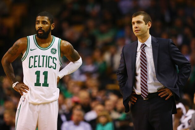 BOSTON, MA - DECEMBER 13:  Kyrie Irving #11 of the Boston Celtics and head coach Brad Stevens look on during the second half against the Denver Nuggets at TD Garden on December 13, 2017 in Boston, Massachusetts.  (Photo by Tim Bradbury/Getty Images)